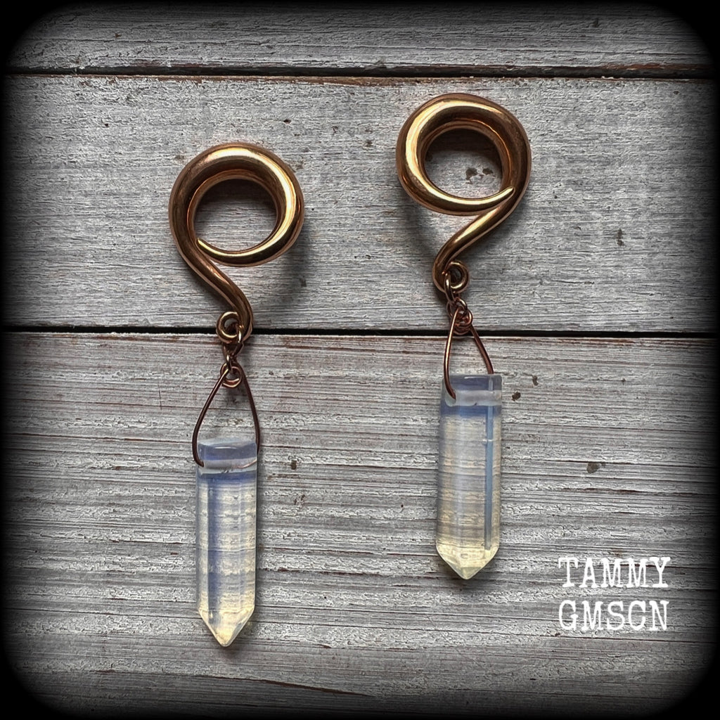 Featuring milky white opalite points, these gorgeous gauged earrings measure 7.5cms from tip to tip, and weigh approx 11 grams each.
This pair has been made on 2 gauge (6mm) rose gold tone surgical steel full curl hooks, suitable for stretched lobes.
