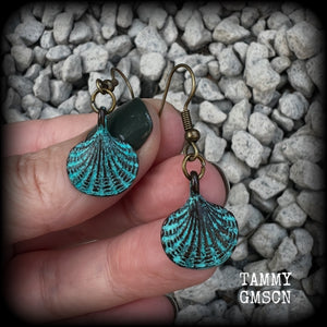 This is a simpler pair of earrings from our Sea Hag range, featuring a single gorgeous verdigris patina charm shell, measuring just under 4cms from tip to tip and weighing only a few grams each.

This pair has been made with antique bronze french hooks, for pierced ears.