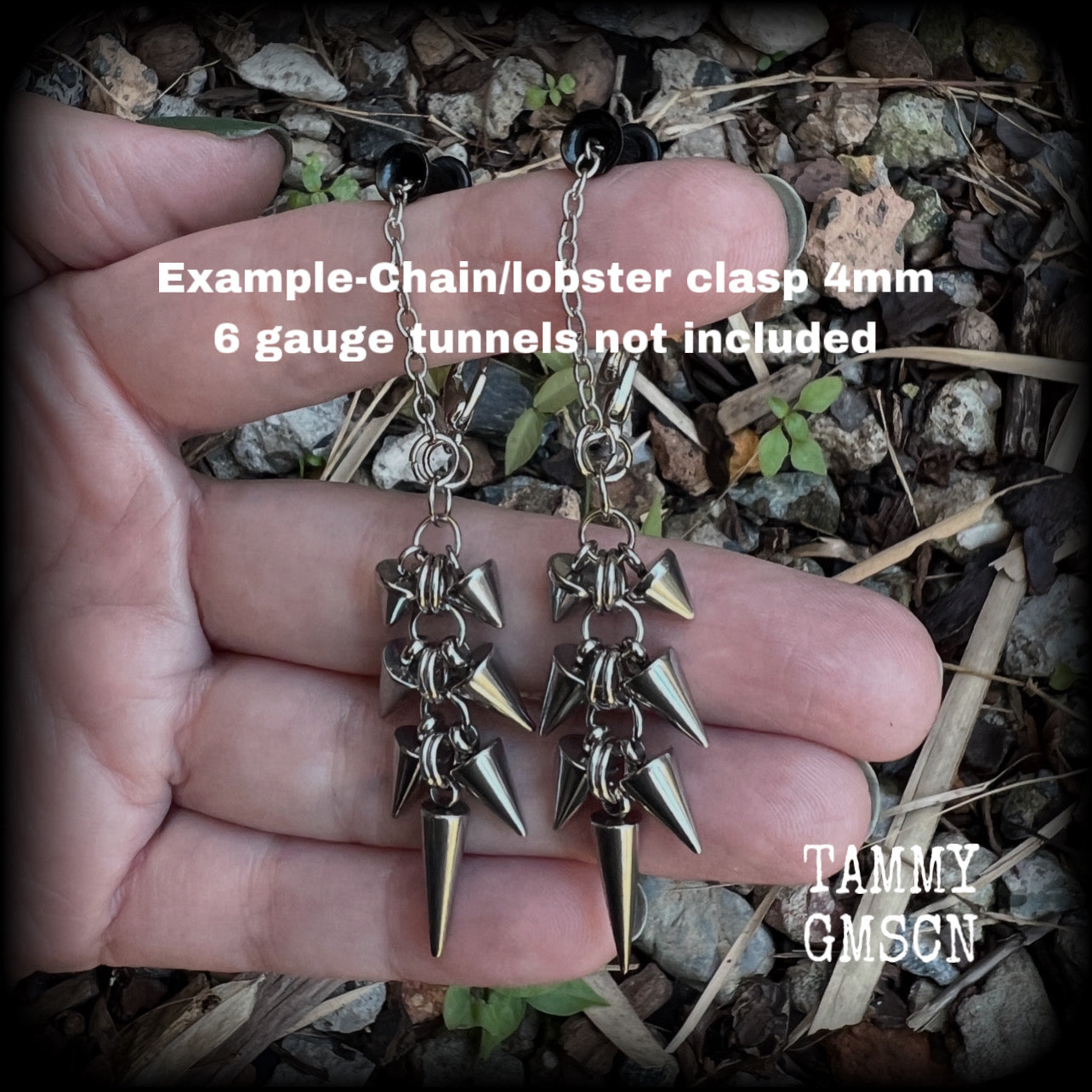 Measuring approx 8cm from top to bottom, these awesome dangly stainless steel punk rock metal spike tunnel earrings are nice and also nice and lightweight, at 7grams a piece.

This pair has been made on our super versatile chain/lobster clasp 4mm option, suitable when worn through tunnel or earlets in stretched lobes from 6 gauge (4mm).