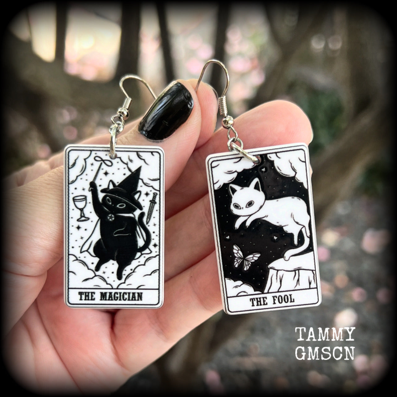 These adorable cat tarot earrings feature The Fool and The Magician lightweight tarot card charms, weighing only a few grams each, and measure approx 5cms from tip to tip.

This pair has been made with stainless steel french hooks, for pierced ears.