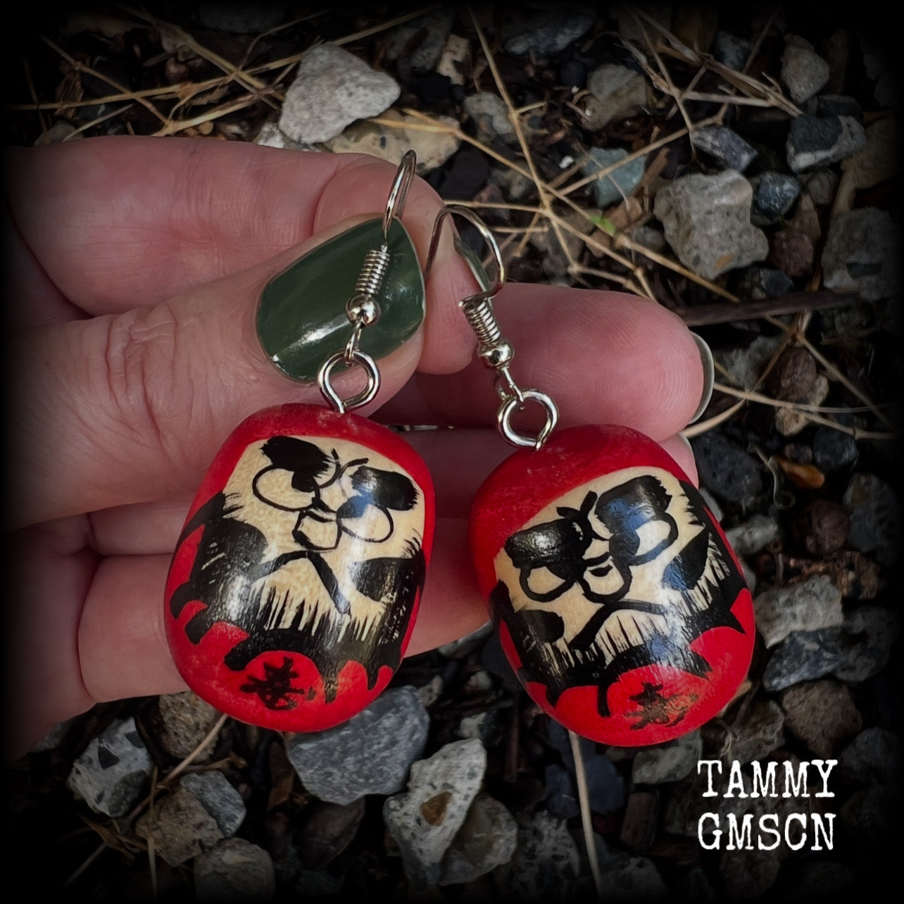 We found these amazing vintage wooden hand painted daurma dolls at our favourite temple markets, Sen do-ji!

Measuring just over 5cms from tip to tip and weighing only 5 grams each, these amazing wooden daruma earrings have been made with stainless steel french hooks, for pierced ears.