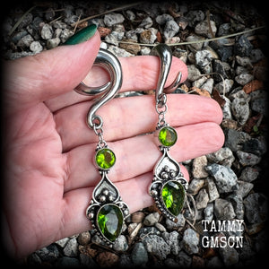 This pair of earrings features gorgeous green quartz and peridot gemstones in a boho antique silver setting, weighing approx 19 grams a piece and measuring just on 8.5cms from tip to tip.  This pair have been made on 0 gauge (8mm) surgical steel full curl hooks, to be worn in stretched lobes.