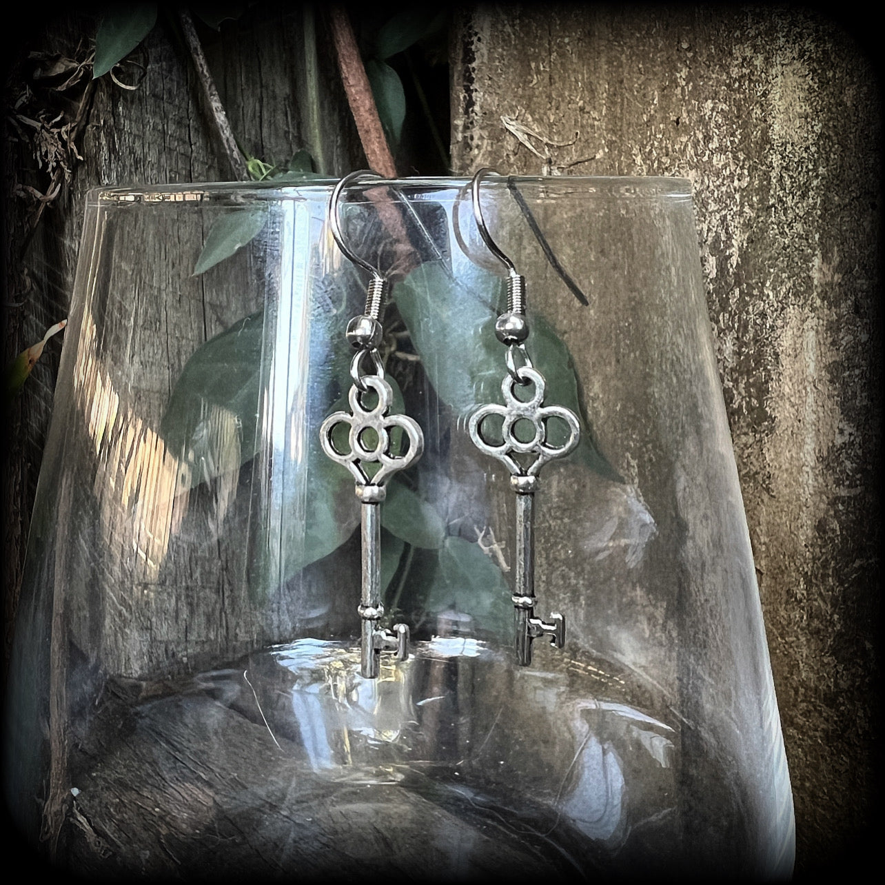 Silver key earrings