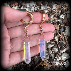 Featuring milky white opalite points, these gorgeous gauged earrings measure 7.5cms from tip to tip, and weigh approx 11 grams each.
This pair has been made on 2 gauge (6mm) rose gold tone surgical steel full curl hooks, suitable for stretched lobes.