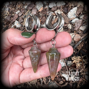 This is a pair of unique beautiful caramel coloured Indian agate gauged earrings, weighing in at approx 11 grams each, and measuring approx 7 cms from tip to tip.
This pair has been made with 5/8” gauge (16mm) stainless steel cradles, suitable for stretched lobes.