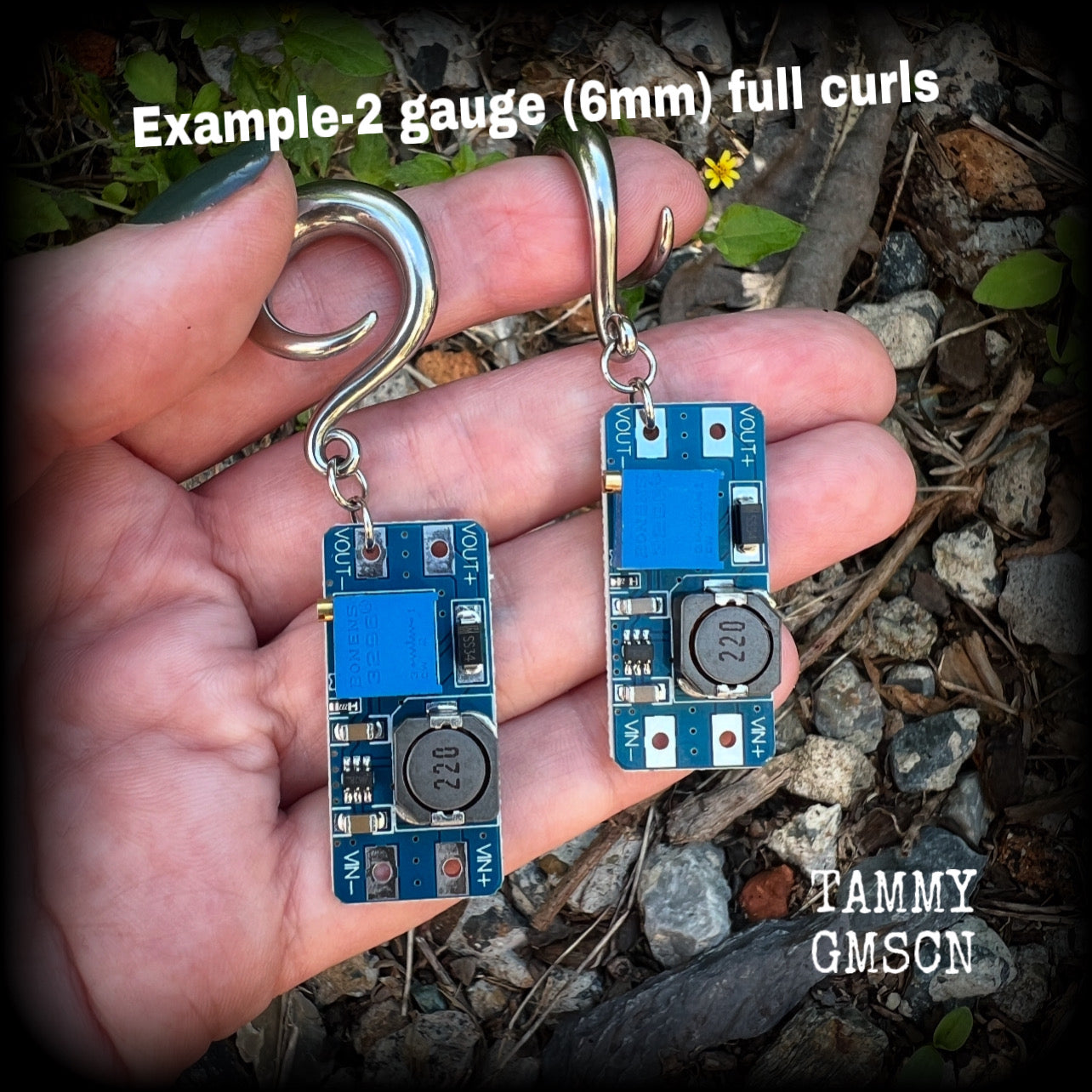 These awesome earrings feature pieces of blue circuitry, are nice and dangly, measuring just on 7cms from tip to tip, and nice and light weight, weighing approx 12 grams each.

This pair has been made on 2 gauge (6mm) surgical steel full curl hooks, to be worn in stretched lobes.