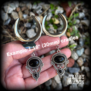 These beautiful ear hangers have been made with gorgeous pitch black obsidian gemstones in an antique silver boho setting, lovely and dangly at 8.5cm from tip to tip, and weighing approx 15 grams each.

These earrings have been made on 1.18” gauge (30mm) surgical steel cradles, to be worn in stretched lobes.