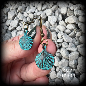 This is a simpler pair of earrings from our Sea Hag range, featuring a single gorgeous verdigris patina charm shell, measuring just under 4cms from tip to tip and weighing only a few grams each.

This pair has been made with antique bronze french hooks, for pierced ears.