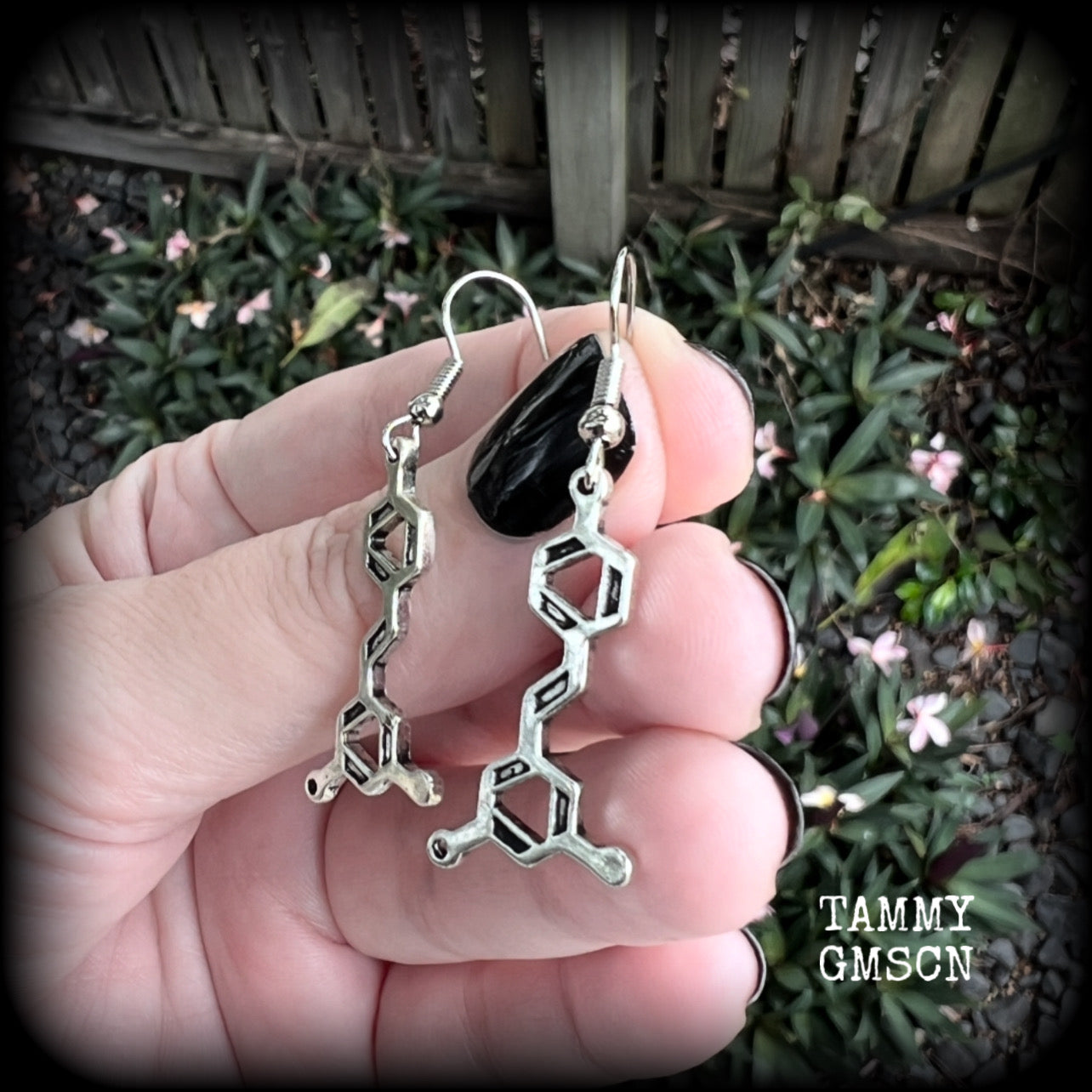 These awesome earrings feature red wine molecules, measuring just under 5cms from tip to tip, and are nice and lightweight, weighing only a few grams each.

This pair have been made with stainless steel french hooks, suitable for pierced ears.