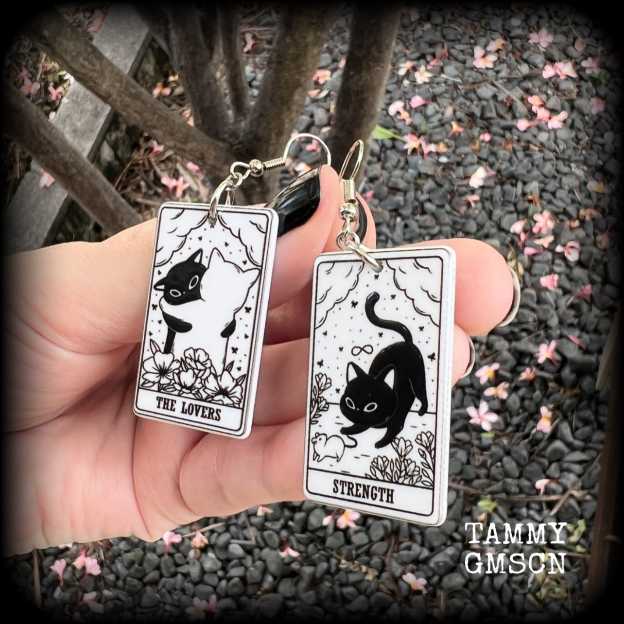 These adorable cat tarot earrings feature The Lovers and Strength lightweight tarot card charms, weighing only a few grams each, and measure approx 5cms from tip to tip.

This pair has been made with stainless steel french hooks, for pierced ears.
