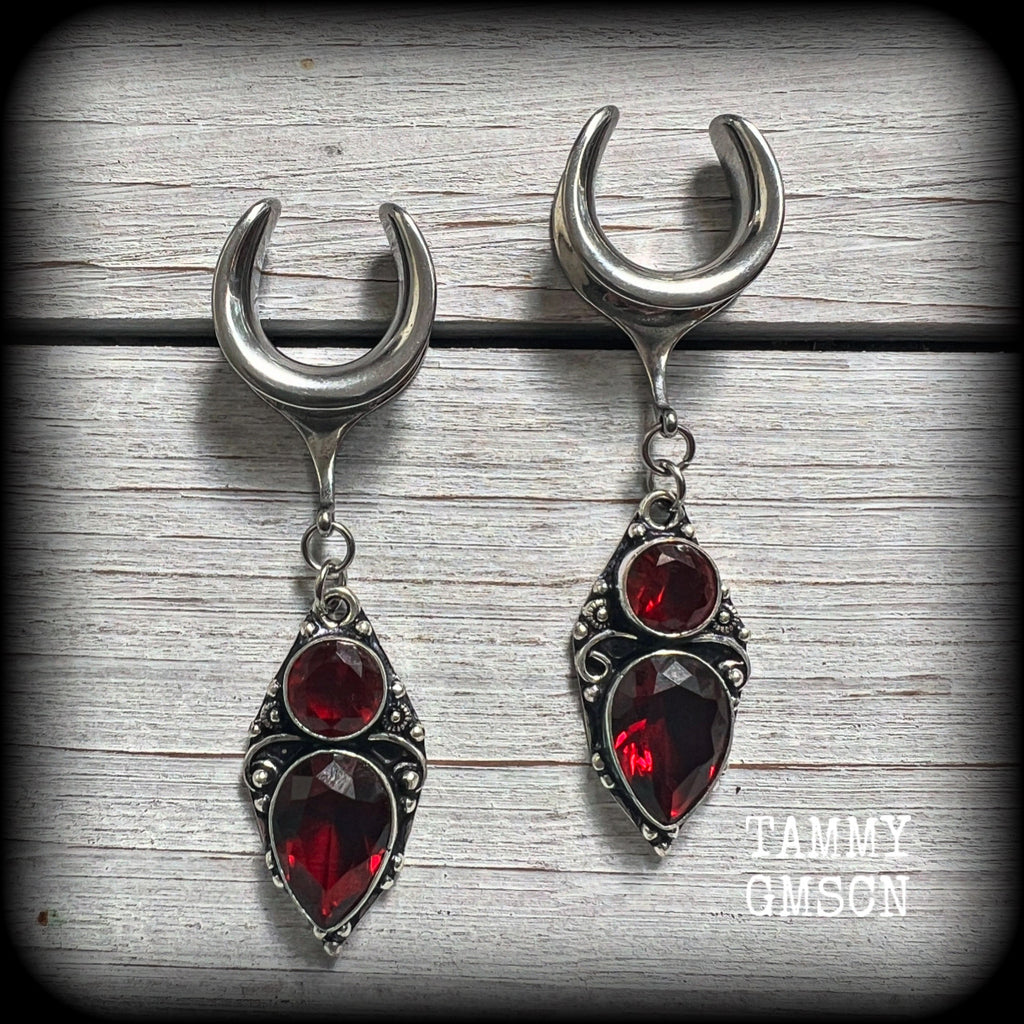 These beautiful boho Garnet ear hangers are made with gorgeous facet gemstones in a beautiful boho antique silver setting, measuring just on 6.5cms from tip to tip, and weighing only 9 grams each, nice and lightweight.

These earrings have been made on 5/8" gauge (16mm) surgical steel cradles, to be worn in stretched lobes.