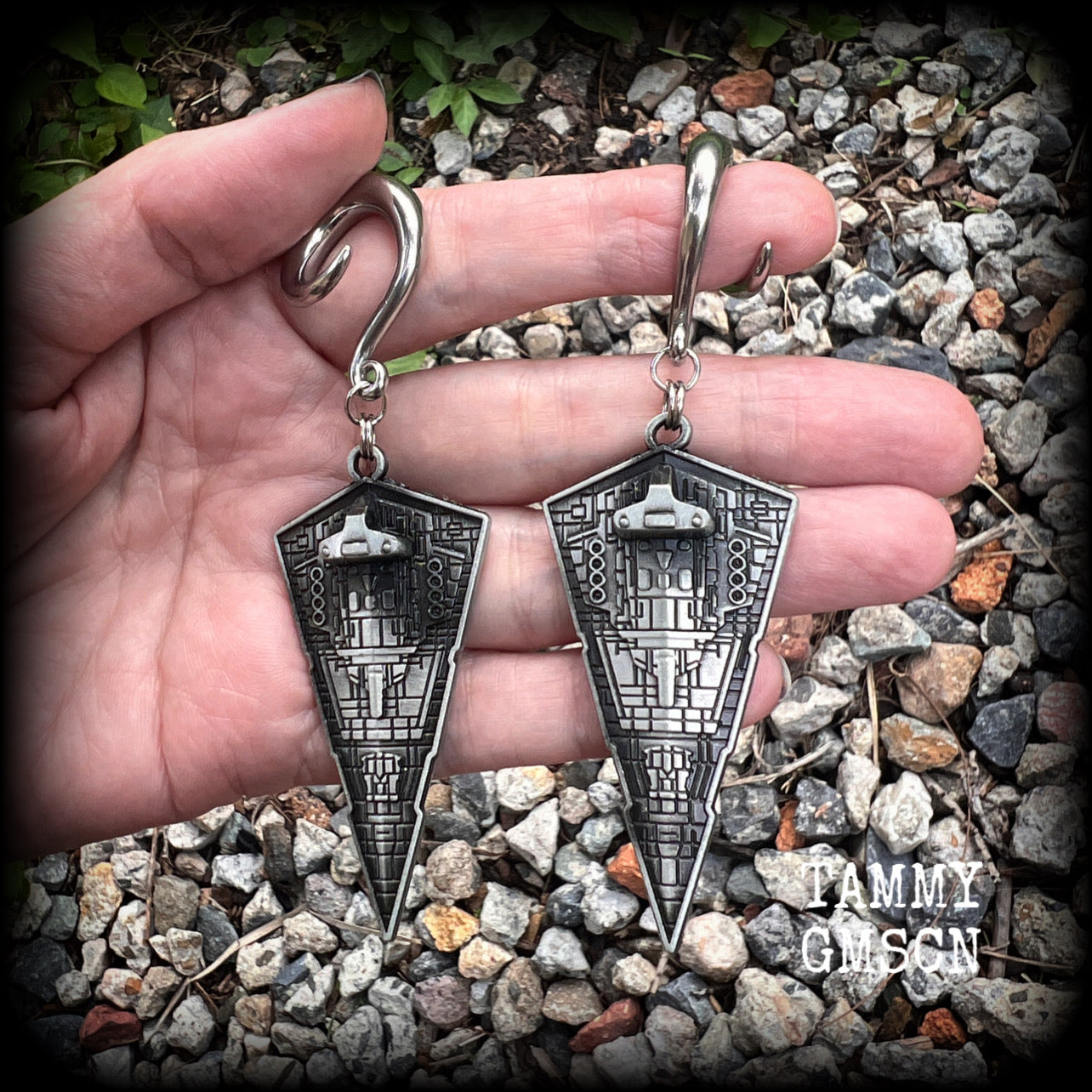 These awesome Star Wars Imperial Star Destroyer gauged earrings are nice and big, measuring just under 10cms from tip to tip, and not too heavy at 28 grams a piece.


This pair has been made on 2 gauge (6mm) surgical steel full curl hooks, to be worn in stretched lobes.