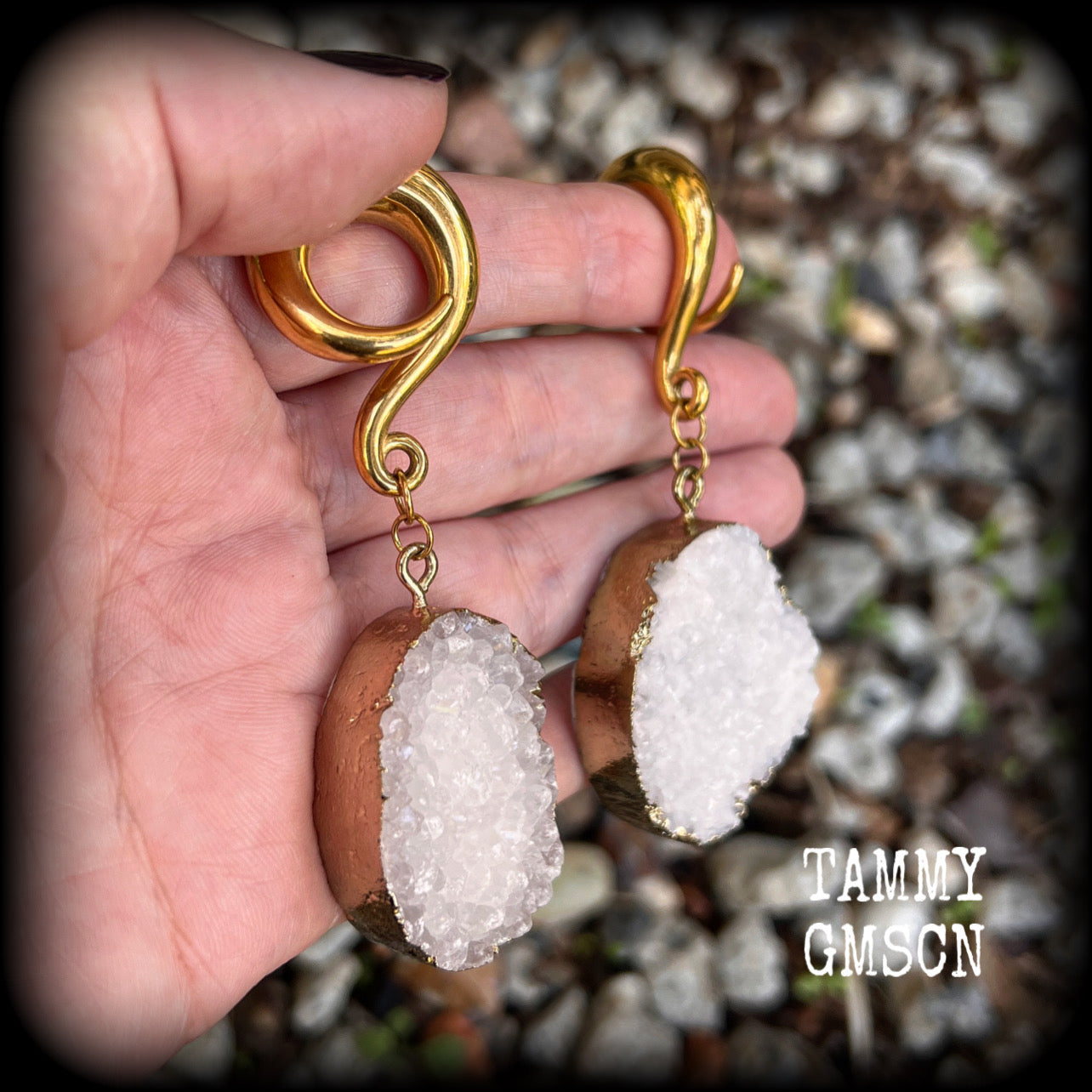 These big beautiful gauged earrings feature snow white and antique gold druzy pieces, measuring just on 8cms from tip to tip, and weighing approx 35 grams a piece.

This pair have been made on 0 gauge (8mm) surgical steel full curl hooks, suitable for stretched lobes.