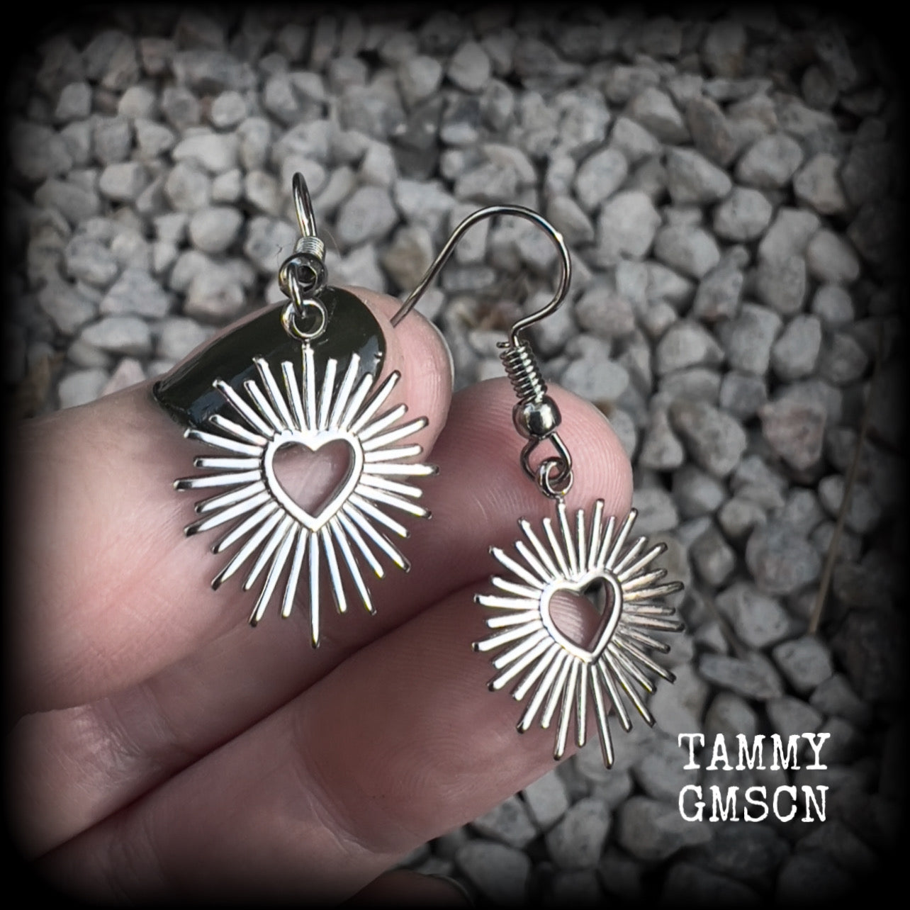 These adorable antique silver sacred heart earrings are nice and lightweight at only a gram or two a piece, and not too dangly, measuring just on 4cms from tip to tip.

This pair has been made on stainless steel french hooks to be worn through pierced ears.