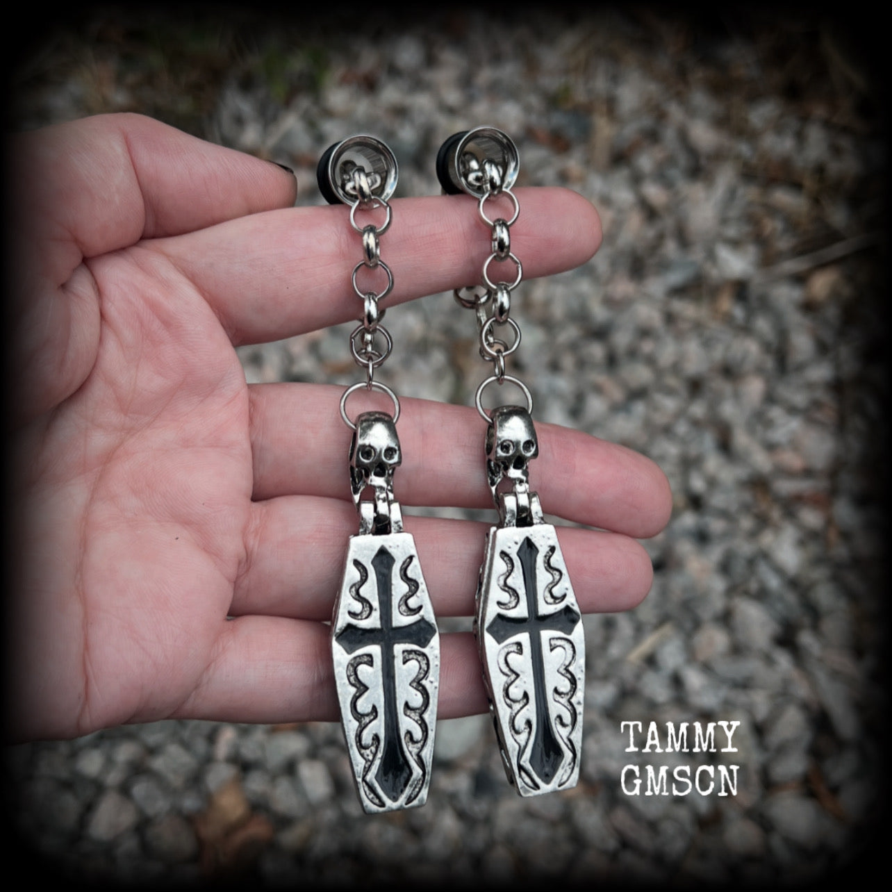 These beautiful antique silver and black enamel coffin tunnel dangles are nice and dangly, weighing approx 25 grams each, and measuring just over 11cms from tip to tip.

⚰️ This listing is for a chunky chain/lobster clasp combination suitable for 00 gauge and larger. 
If you choose a smaller size of tunnel than 00 gauge we will make these on a smaller chain.