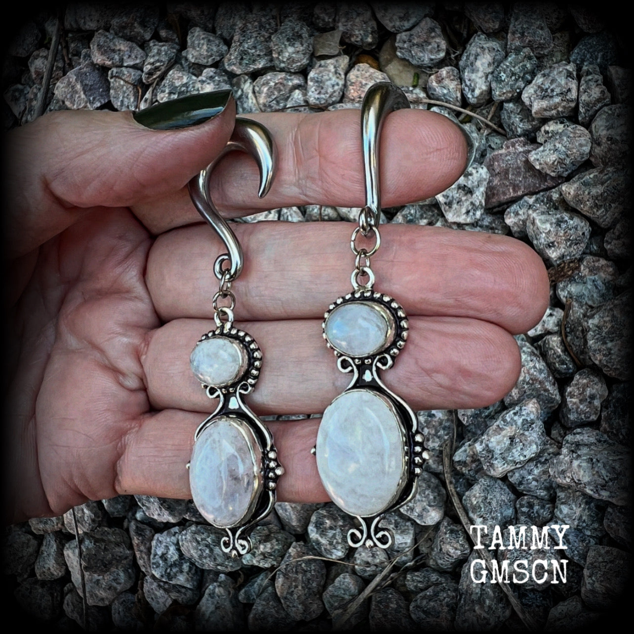 These gauged earrings have been made with gorgeous big polished Rainbow moonstone gemstones in a beautiful boho antique silver setting, measuring approx 8cms from tip to tip, and weighing approx 12 grams each, not too heavy.

These earrings have been made on 2 gauge (6mm) surgical steel half curl hooks, to be worn in stretched lobes.