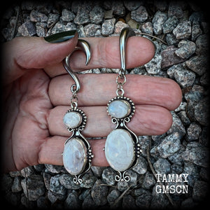 These gauged earrings have been made with gorgeous big polished Rainbow moonstone gemstones in a beautiful boho antique silver setting, measuring approx 8cms from tip to tip, and weighing approx 12 grams each, not too heavy.

These earrings have been made on 2 gauge (6mm) surgical steel half curl hooks, to be worn in stretched lobes.