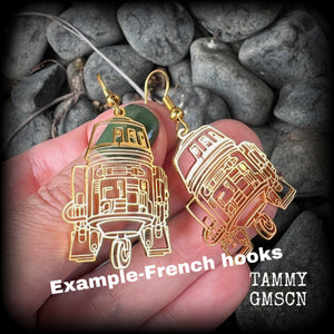 Featuring awesome stainless steel R2D2 charms, these earrings measure just over 5cms from tip to tip, and are super lightweight, weighing only a gram or two.
This pair has been made with french hooks, suitable for pierced ears.