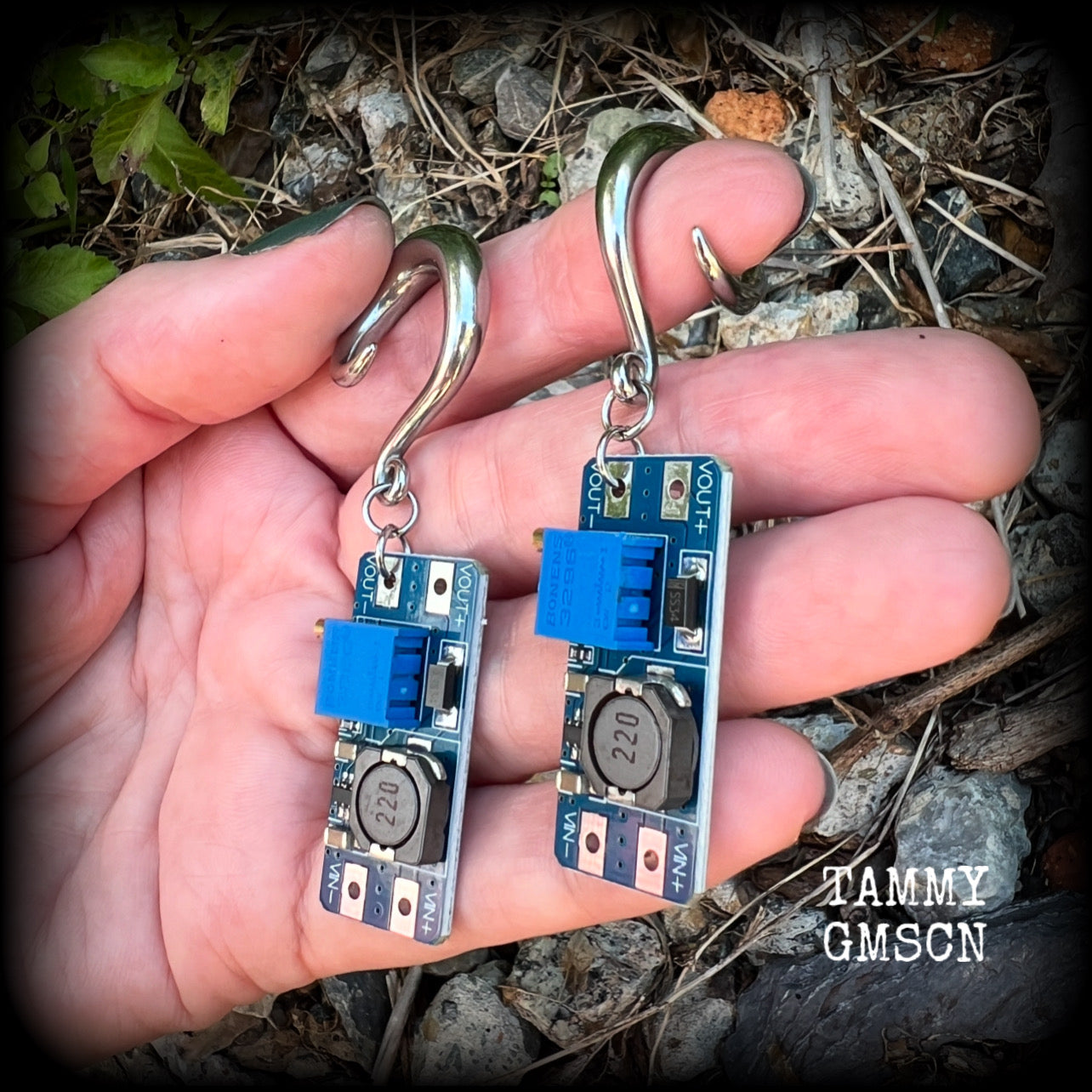 These awesome earrings feature pieces of blue circuitry, are nice and dangly, measuring just on 7cms from tip to tip, and nice and light weight, weighing approx 12 grams each.

This pair has been made on 2 gauge (6mm) surgical steel full curl hooks, to be worn in stretched lobes.