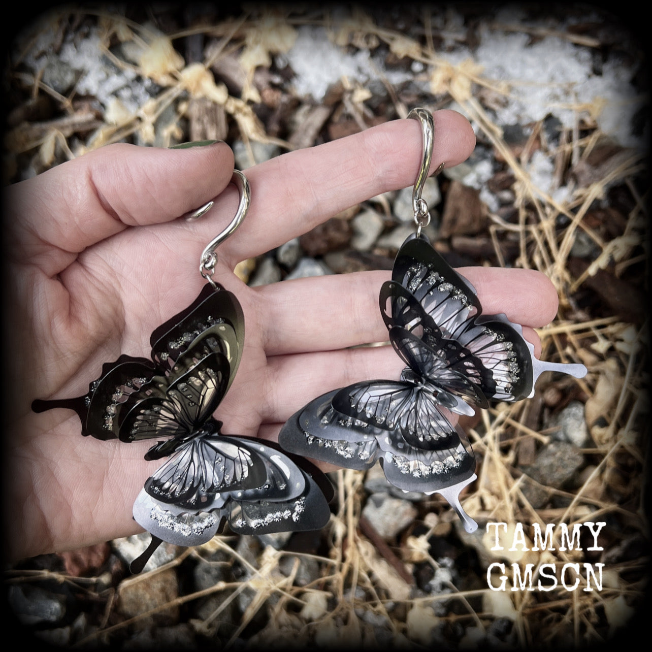 These gorgeous gauged glittery earrings feature beautiful big swallowtail butterflies, super lightweight at just 5 grams a piece, measuring 11cms from tip to tip.

This pair have been made on 6 gauge (4mm) surgical steel full curls, to be worn through stretched lobes.