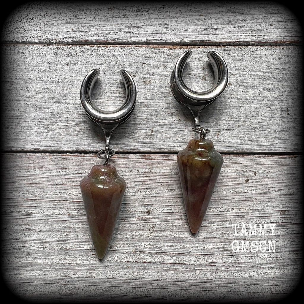 This is a pair of unique beautiful caramel coloured Indian agate gauged earrings, weighing in at approx 11 grams each, and measuring approx 7 cms from tip to tip.
This pair has been made with 5/8” gauge (16mm) stainless steel cradles, suitable for stretched lobes.

