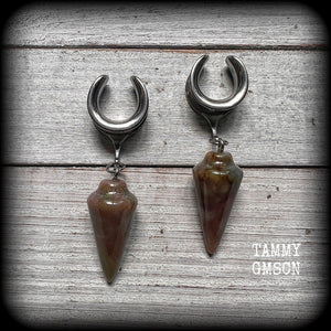 This is a pair of unique beautiful caramel coloured Indian agate gauged earrings, weighing in at approx 11 grams each, and measuring approx 7 cms from tip to tip.
This pair has been made with 5/8” gauge (16mm) stainless steel cradles, suitable for stretched lobes.

