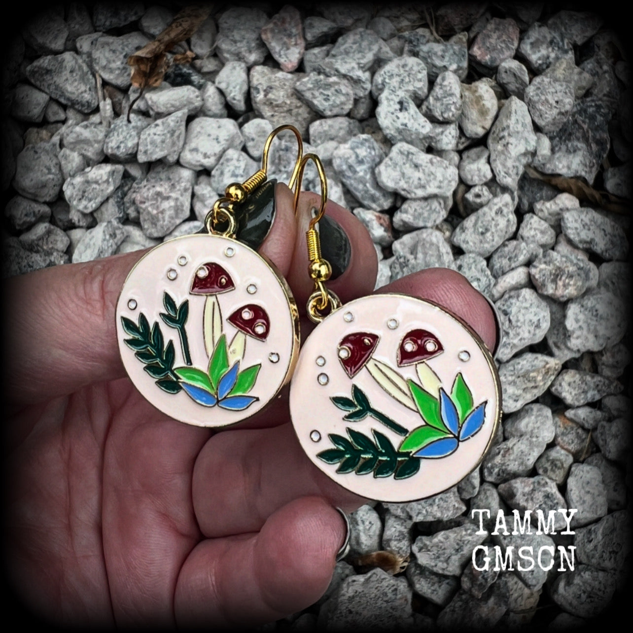 These adorable antique gold and enamel toadstool earrings measure in at just under 5cm, are nice and light, weighing only a few grams each.

This pair has been made with antique gold french hooks, suitable for pierced ears.