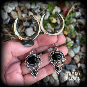 These beautiful ear hangers have been made with gorgeous pitch black obsidian gemstones in an antique silver boho setting, lovely and dangly at 8.5cm from tip to tip, and weighing approx 15 grams each.

These earrings have been made on 1.18” gauge (30mm) surgical steel cradles, to be worn in stretched lobes.