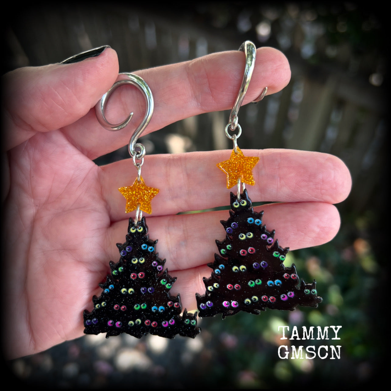 Featuring a spooky cute Christmas tree with STACKED BLACK CATS topped with a glittering gold star, these adorable earrings weigh in at approx 5 grams a piece, and measure approx 8 cms from tip to tip.

This pair has been made on 6 gauge (4mm) surgical steel full curl hooks, to be worn in stretched lobes.