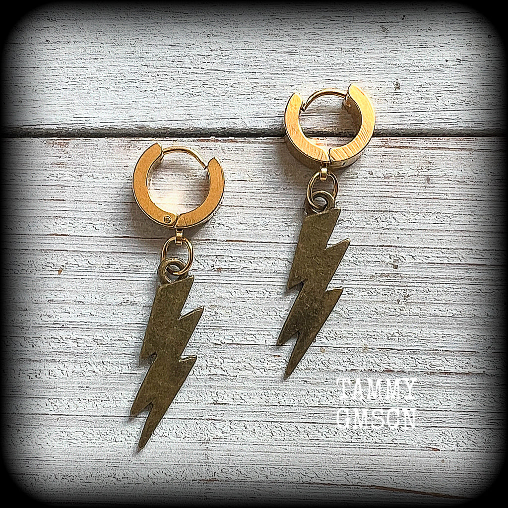 These awesome earrings feature classic antique bronze thunderbolts, are nice and lightweight at approx 3 grams each, and measure in at just under 5cms from tip to tip.

This pair have been made on gold stainless steel huggie ear cuffs, suitable for pierced ears.
