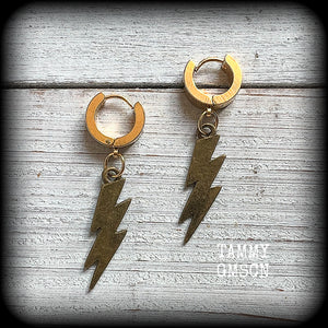 These awesome earrings feature classic antique bronze thunderbolts, are nice and lightweight at approx 3 grams each, and measure in at just under 5cms from tip to tip.

This pair have been made on gold stainless steel huggie ear cuffs, suitable for pierced ears.
