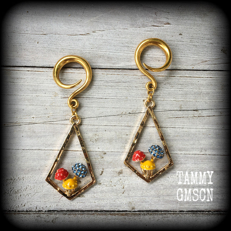 These antique gold and enamel mushroom ear hangers are just gorgeous! Nice and light weight at 7 grams a piece, and nice and dangly at just over 7cms.

This pair has been made on 6 gauge (4mm) surgical steel full curl hooks, suitable for stretched lobes.