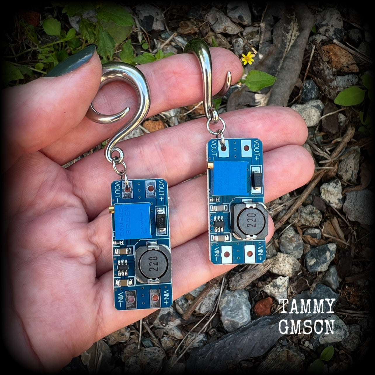 These awesome earrings feature pieces of blue circuitry, are nice and dangly, measuring just on 7cms from tip to tip, and nice and light weight, weighing approx 12 grams each.

This pair has been made on 2 gauge (6mm) surgical steel full curl hooks, to be worn in stretched lobes.