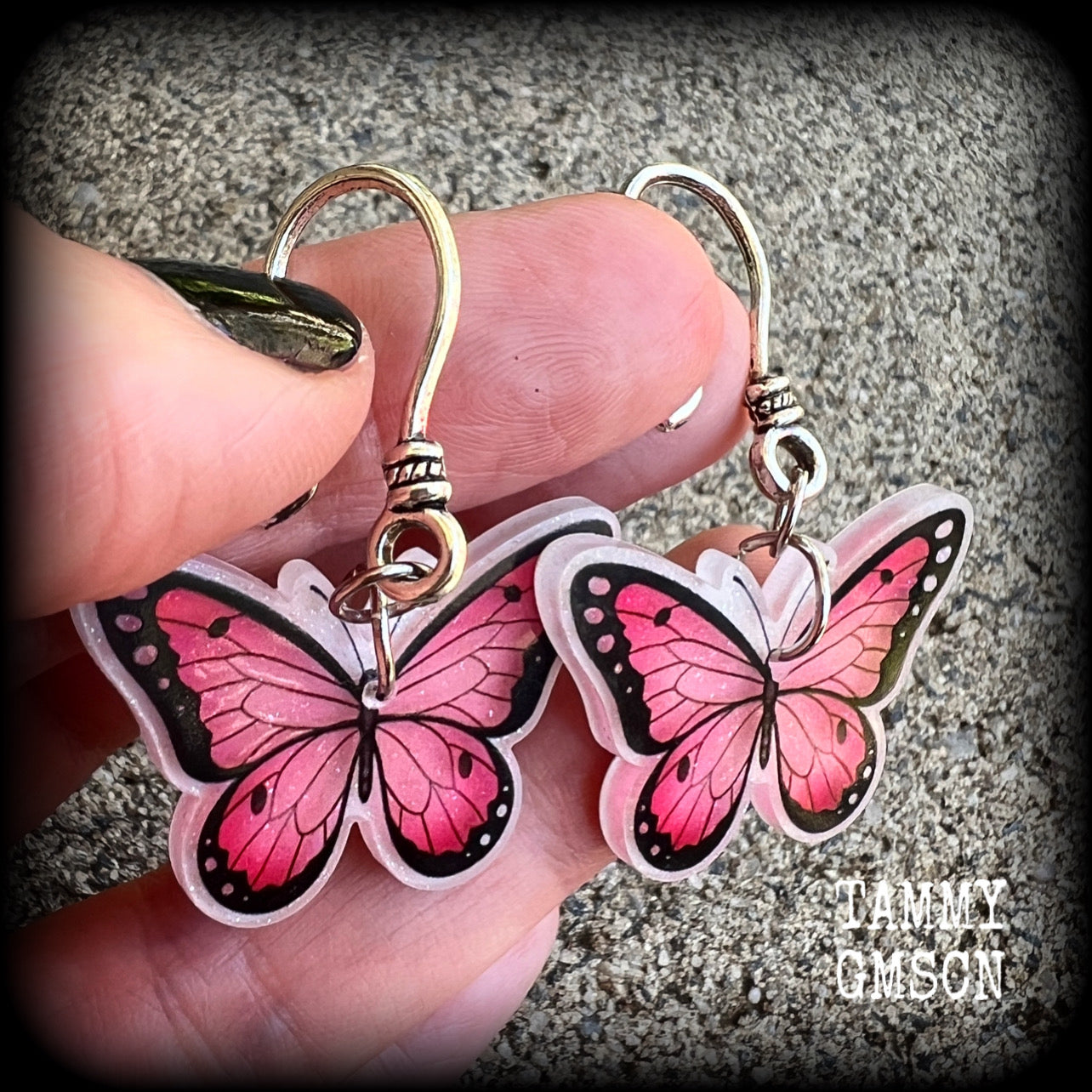 This is a pair of beautiful pink butterfly earrings, available on a selection of hooks and clasps for pierced ears and stretched lobes.