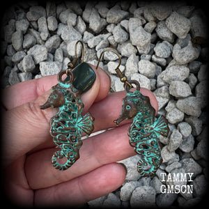 This pair of earrings features a gorgeous antique verdigris patina seahorse, measuring just under 6cms from tip to tip, and weighing 7 grams each.

This pair has been made with french hooks, for pierced ears.