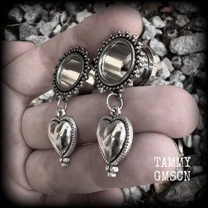 These gorgeous tunnel earrings feature beautiful antique silver hearts, are nice and lightweight, weighing only 7 grams each and measure approx 4.5cms from tip to tip.
This pair has been made with 9/16" (14mm) gauge ornate surgical steel screw fit tunnels.