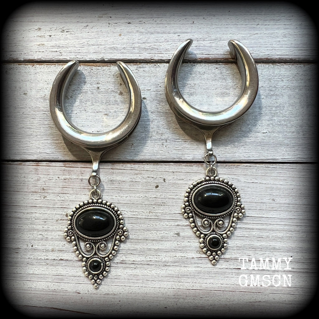 These beautiful ear hangers have been made with gorgeous pitch black obsidian gemstones in an antique silver boho setting, lovely and dangly at 8.5cm from tip to tip, and weighing approx 15 grams each.

These earrings have been made on 1.18” gauge (30mm) surgical steel cradles, to be worn in stretched lobes.