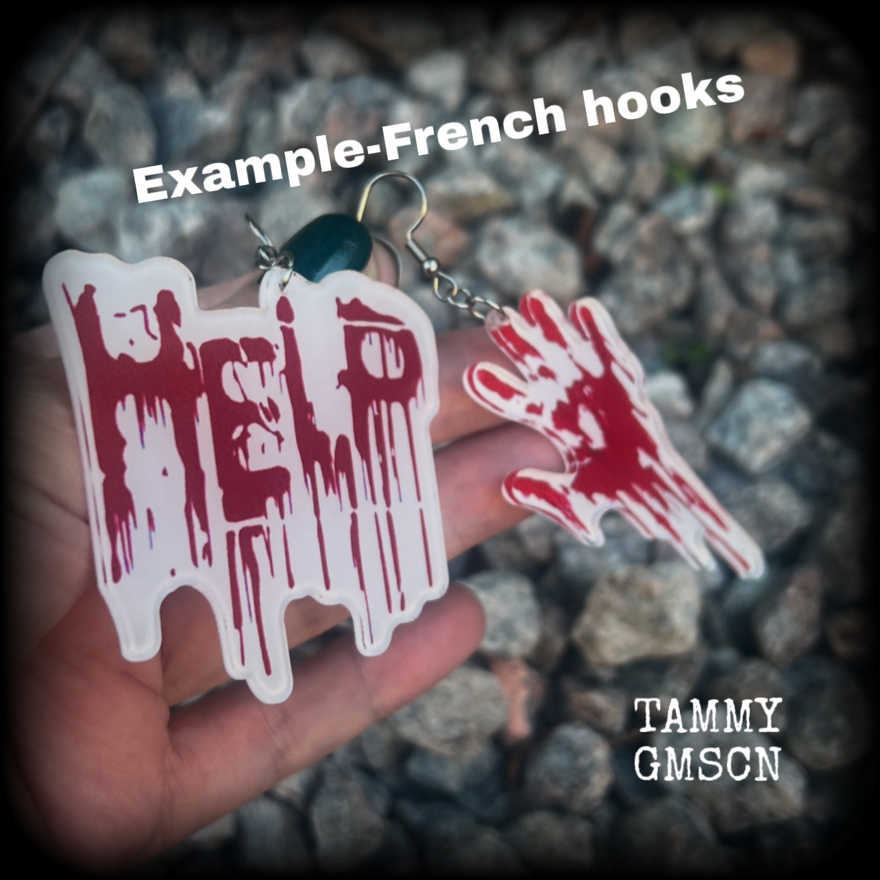 These awesome horror movie inspired earrings feature a bloodied hand print alongside ‘HELP’ finger painted in blood, measuring approx 7.5cms from tip to tip, and weigh only a few grams each.

This pair has been made with stainless steel french hooks, suitable for pierced ears.