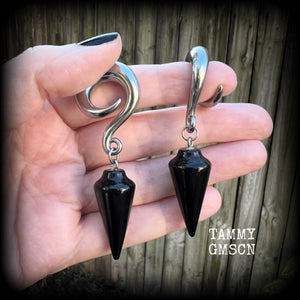 These earrings have been made with gorgeous pitch black obsidian pendulums, measuring 7.5cms from tip to tip, and weighing approx 22 grams each.

This pair have been made with 00 gauge (10mm) surgical steel full curl hooks, to be worn in stretched lobes.