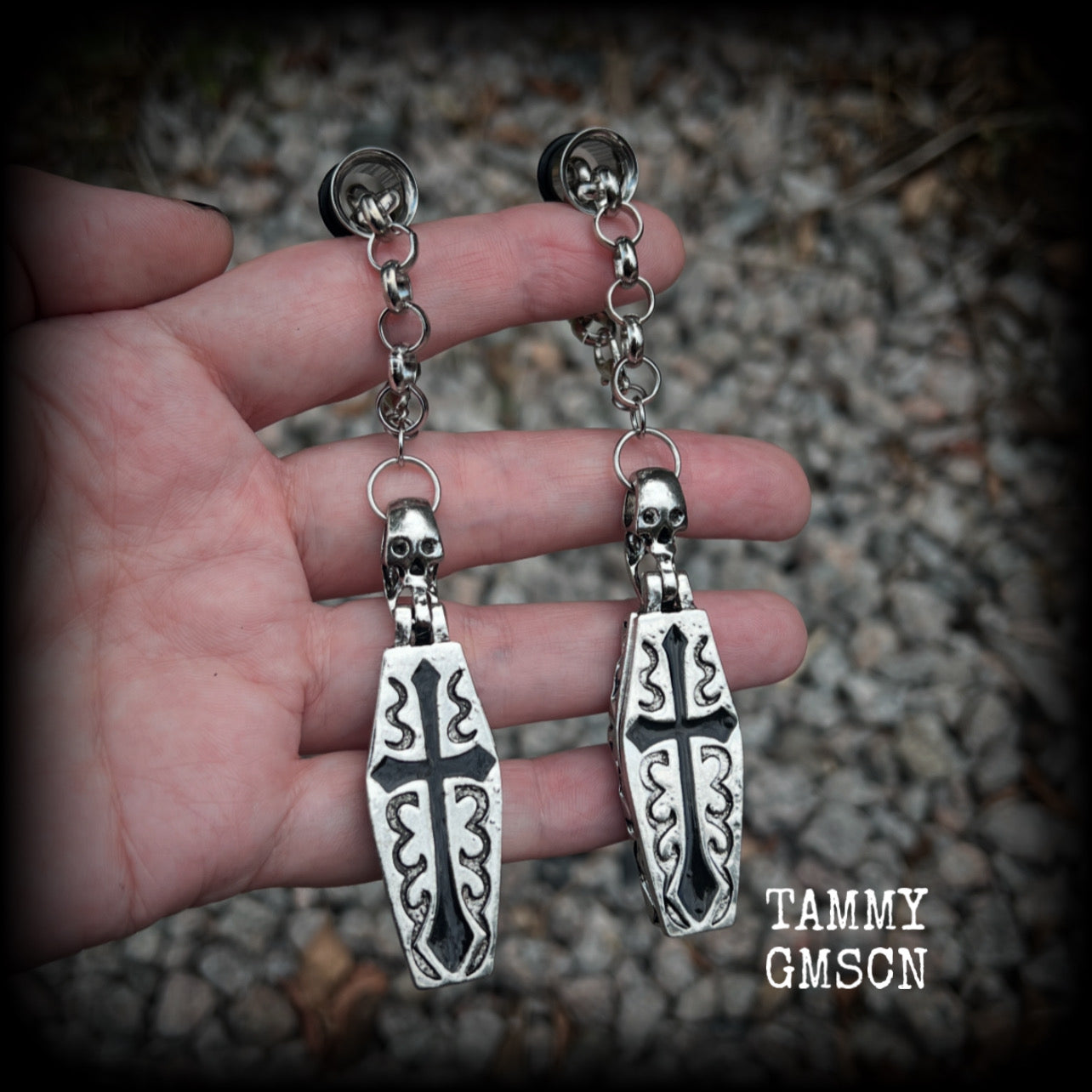 These beautiful antique silver and black enamel coffin tunnel dangles are nice and dangly, weighing approx 25 grams each, and measuring just over 11cms from tip to tip.

⚰️ This listing is for a chunky chain/lobster clasp combination suitable for 00 gauge and larger. 
If you choose a smaller size of tunnel than 00 gauge we will make these on a smaller chain.