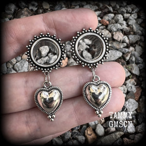These gorgeous tunnel earrings feature beautiful antique silver hearts, are nice and lightweight, weighing only 7 grams each and measure approx 4.5cms from tip to tip.
This pair has been made with 9/16" (14mm) gauge ornate surgical steel screw fit tunnels.