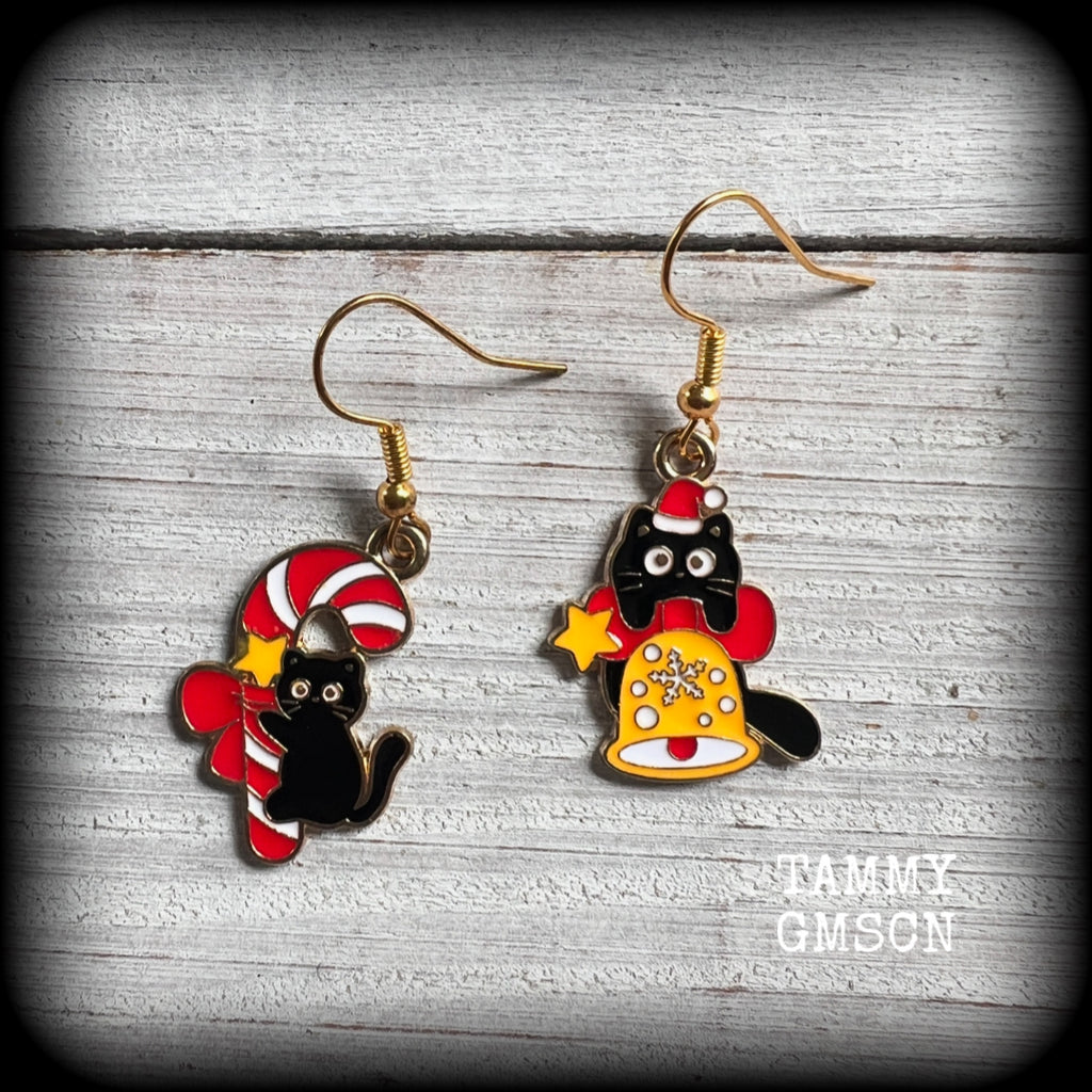 These adorable earrings feature mischievous black cats with Christmas decorations, measuring approx 3.5cms from tip to tip and weighing only a few grams each. 

This pair has been made on antique gold french hooks, for pierced ears.
