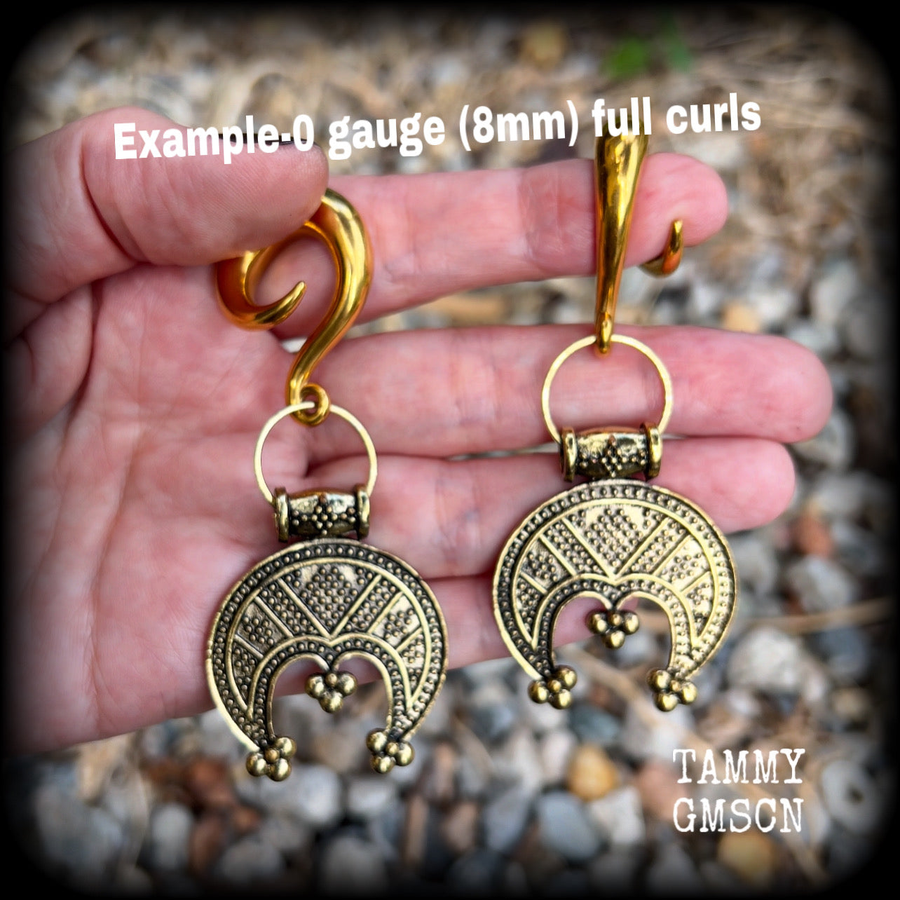 These beautiful gauged earrings feature stunning antique gold Pictish pendants, weighing approx 24 grams each, and are nice and dangly, measuring just over 9cms from tip to tip.
This pair have been made on 0 gauge (8mm) surgical steel full curl hooks, suitable for stretched lobes.