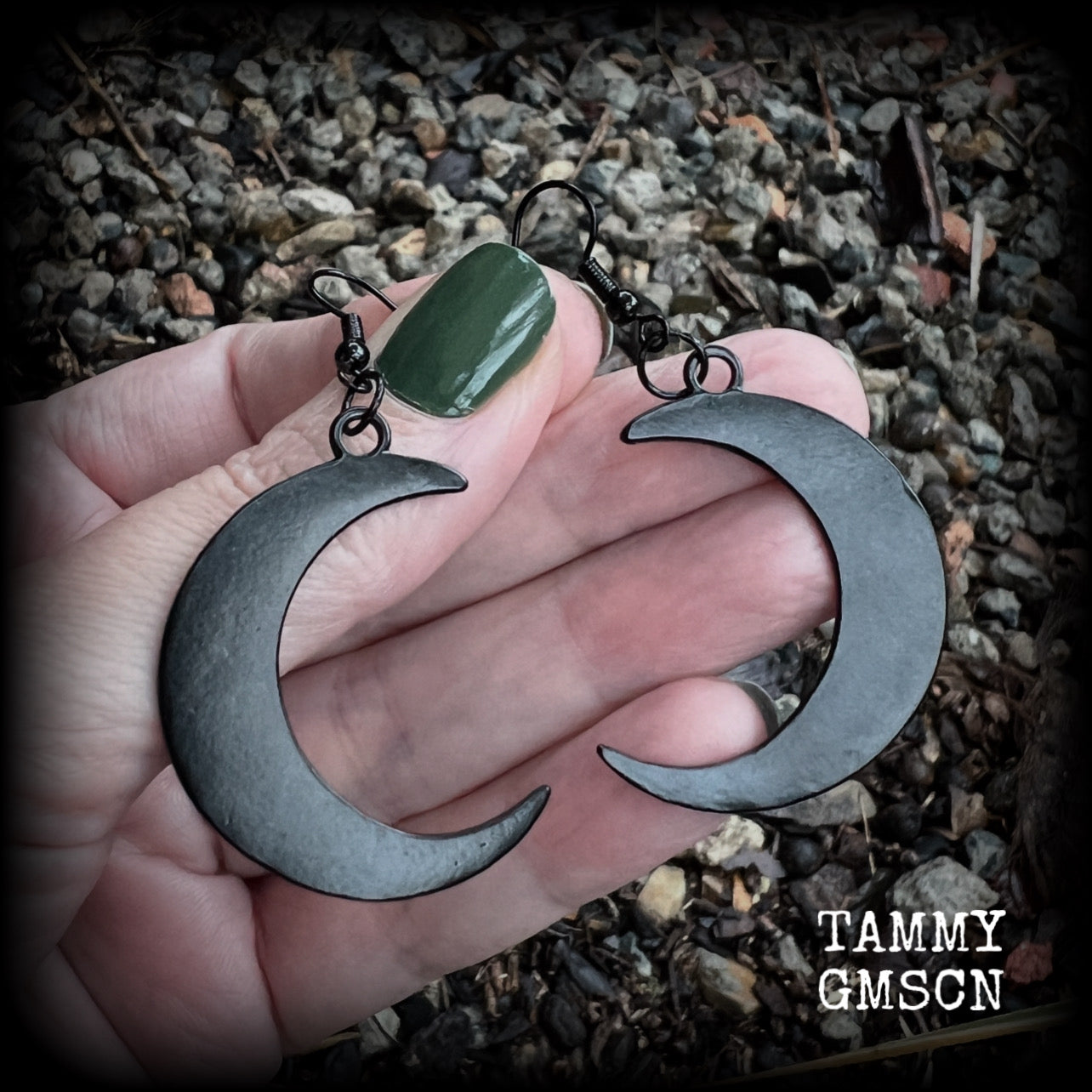 Featuring large black enamel crescent moons, these stunning crescent moon earrings measure just under 7cms from tip to tip and are nice and light weight at approx 5 grams each.

This pair has been made with french hooks, for pierced ears.
