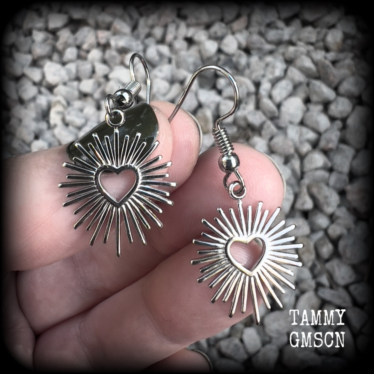 These adorable antique silver sacred heart earrings are nice and lightweight at only a gram or two a piece, and not too dangly, measuring just on 4cms from tip to tip.

This pair has been made on stainless steel french hooks to be worn through pierced ears.