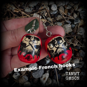 We found these amazing vintage wooden hand painted daurma dolls at our favourite temple markets, Sen do-ji!

Measuring just over 5cms from tip to tip and weighing only 5 grams each, these amazing wooden daruma earrings have been made with stainless steel french hooks, for pierced ears.