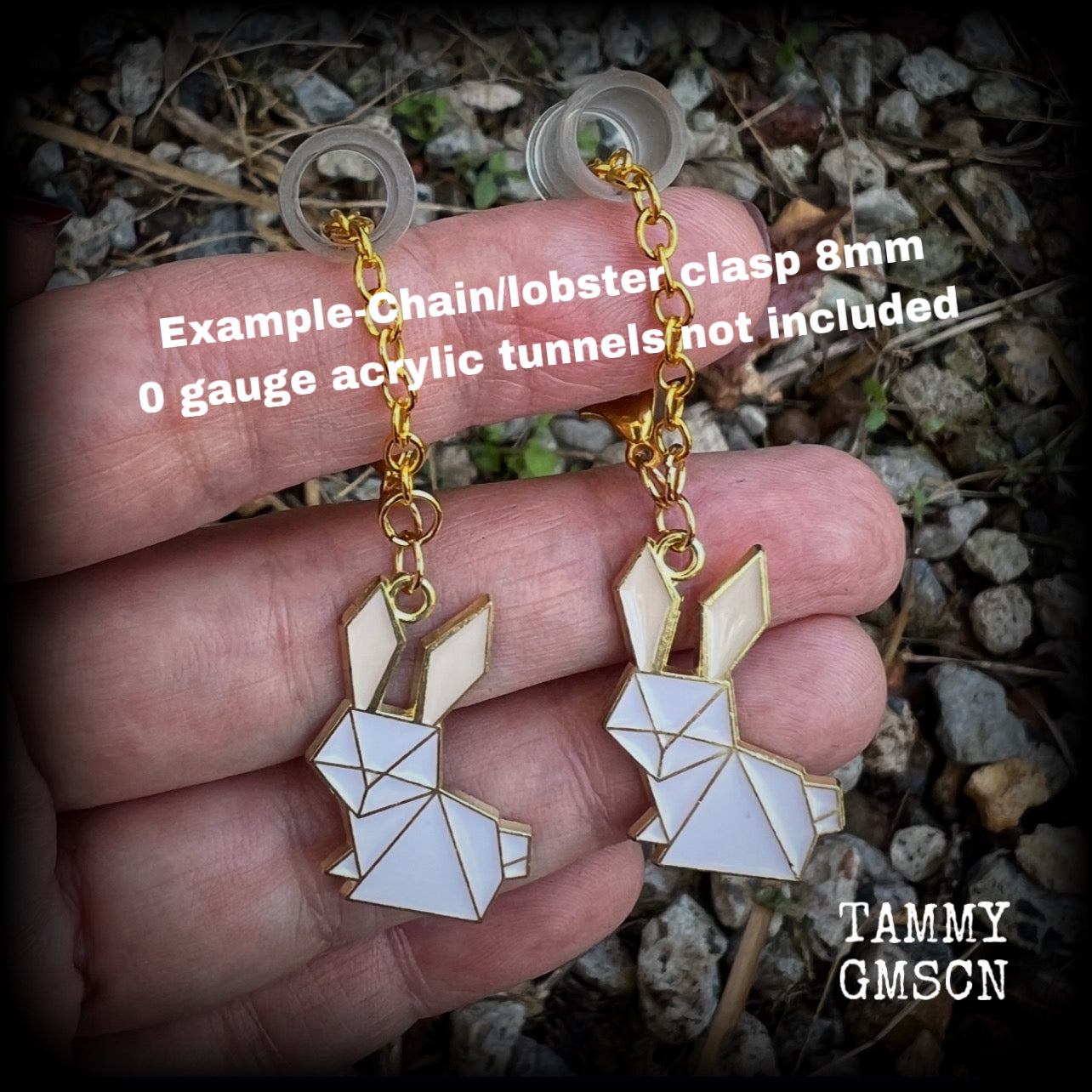 Super cute and super light weight, these adorable earrings feature white enamel and antique gold origami white rabbit charms. Measuring approx 6 from tip to tip and weighing only a gram or two each, this pair has been made with our chain/lobster clasp 8mm option.
