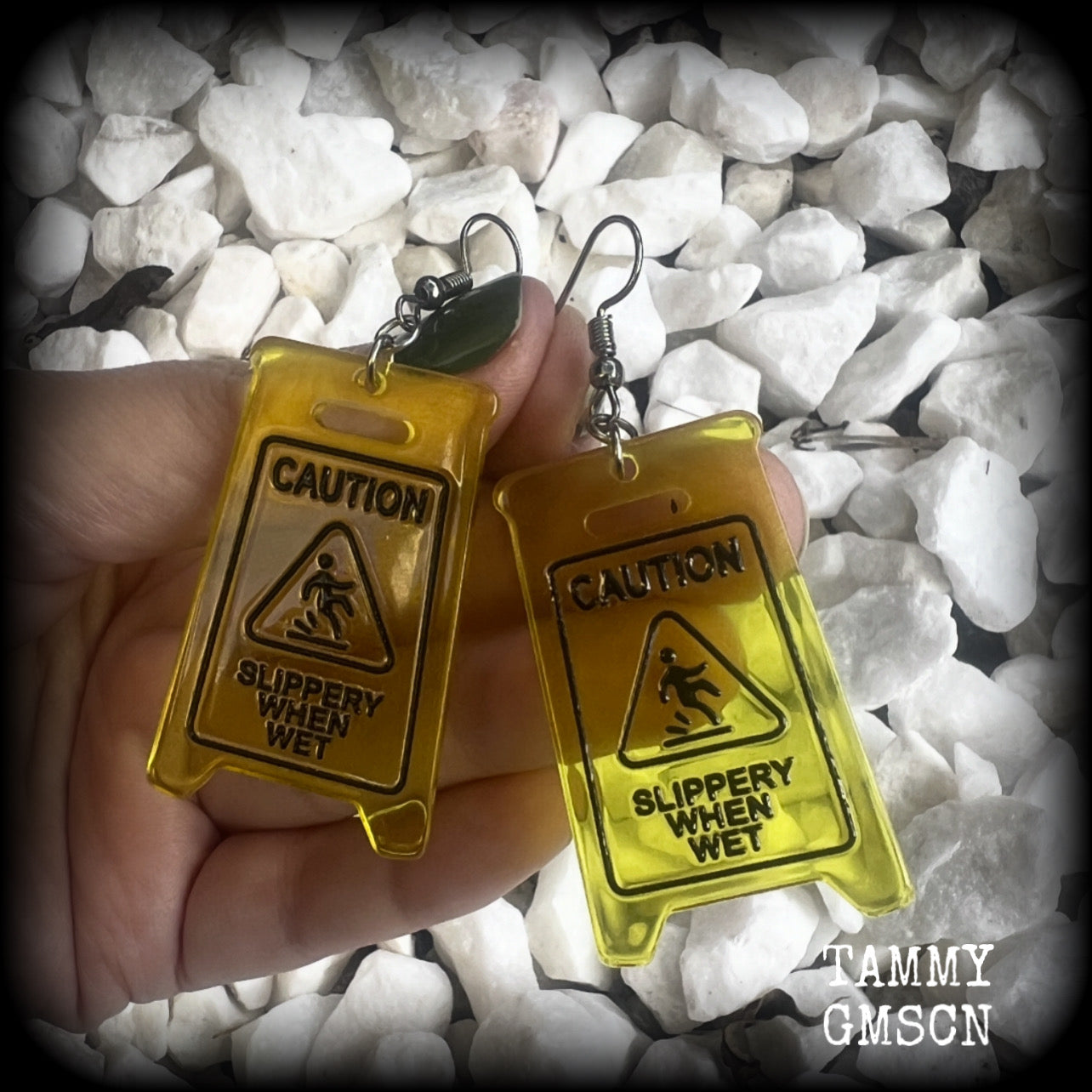 These awesome fluoro yellow acrylic ‘Slippery when wet’ sign earrings measure in at just on 7cms, are nice and light weighing only 4 grams each.

This pair has been made with stainless steel french hooks, for pierced ears.