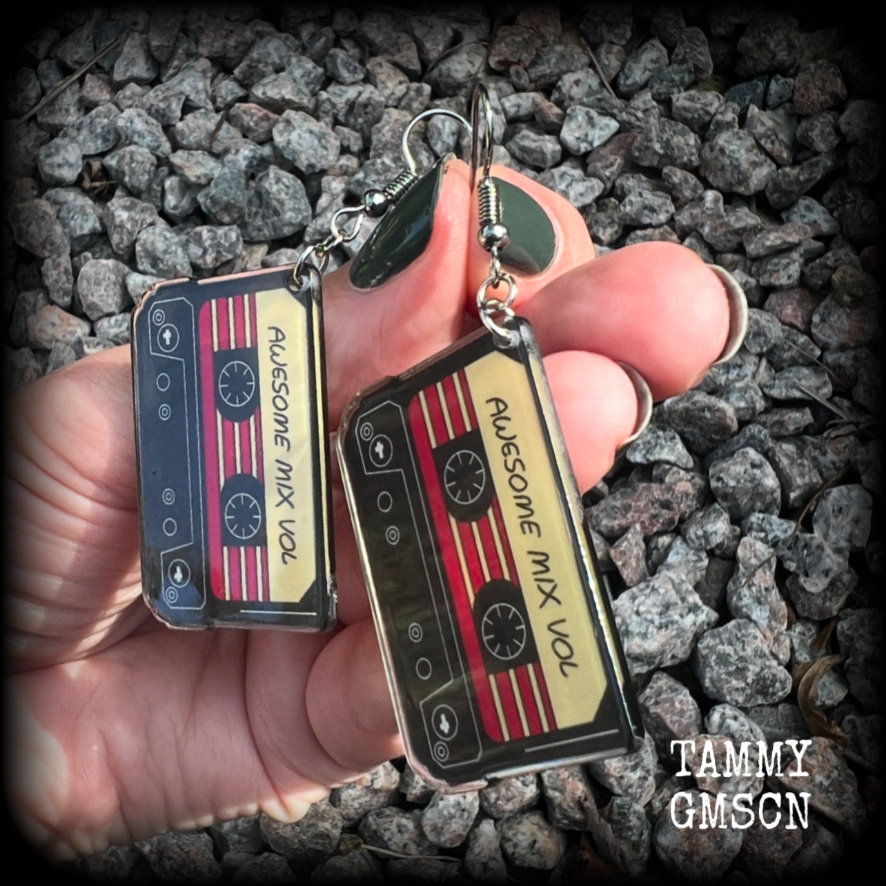 This awesome pair of earrings features a pair of classic 80’s mix tapes, are nice and lightweight weighing only a few grams each, and measure approx 7cms from tip to tip.

This pair has been made on stainless steel french hooks, suitable for pierced ears.