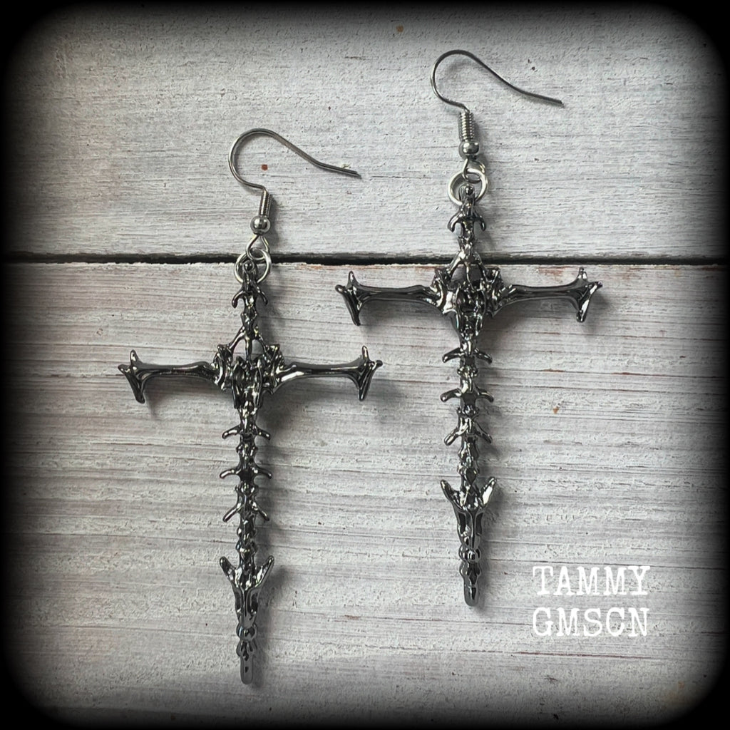 These gorgeous gothic earrings feature gunmetal grey skeleton crosses, measuring just over 8 cms from tip to tip, and weigh approx 7 grams a piece.

This pair have been made on stainless steel french hooks, suitable for pierced ears.